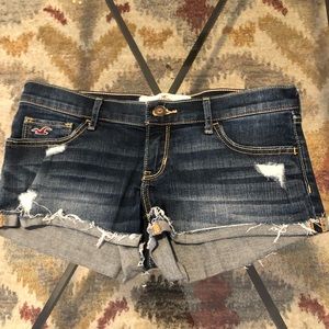 Dark wash destructed denim shorts